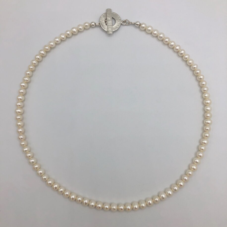 White Freshwater Pearl Necklace by Val Nunns at The Avenue Gallery, a contemporary fine art gallery in Victoria, BC, Canada.