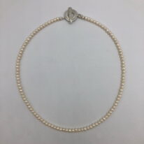 Small White Freshwater Pearl Necklace by Val Nunns at The Avenue Gallery, a contemporary fine art gallery in Victoria, BC, Canada.