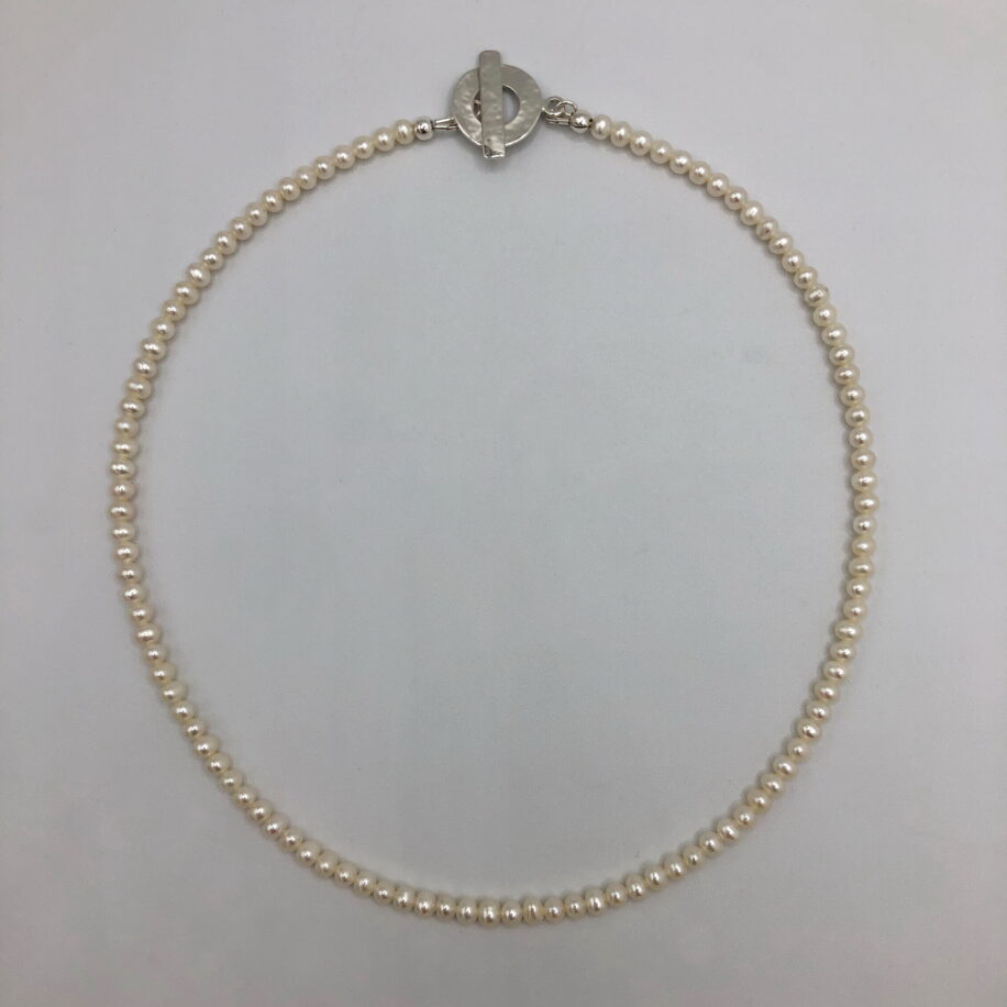 Small White Freshwater Pearl Necklace by Val Nunns at The Avenue Gallery, a contemporary fine art gallery in Victoria, BC, Canada.