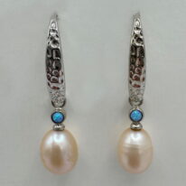 Freshwater Pearl & Opal Earrings by Val Nunns at The Avenue Gallery, a contemporary fine art gallery in Victoria, BC, Canada.