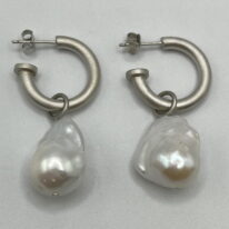 White Baroque Pearl & Rhodium-Plated Silver Hoop Earrings by Val Nunns at The Avenue Gallery, a contemporary fine art gallery in Victoria, BC, Canada.