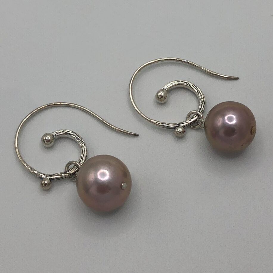 Edison Pearl & Sterling Silver Hammered Curled Wire Earrings by Val Nunns at The Avenue Gallery, a contemporary fine art gallery in Victoria, BC, Canada.