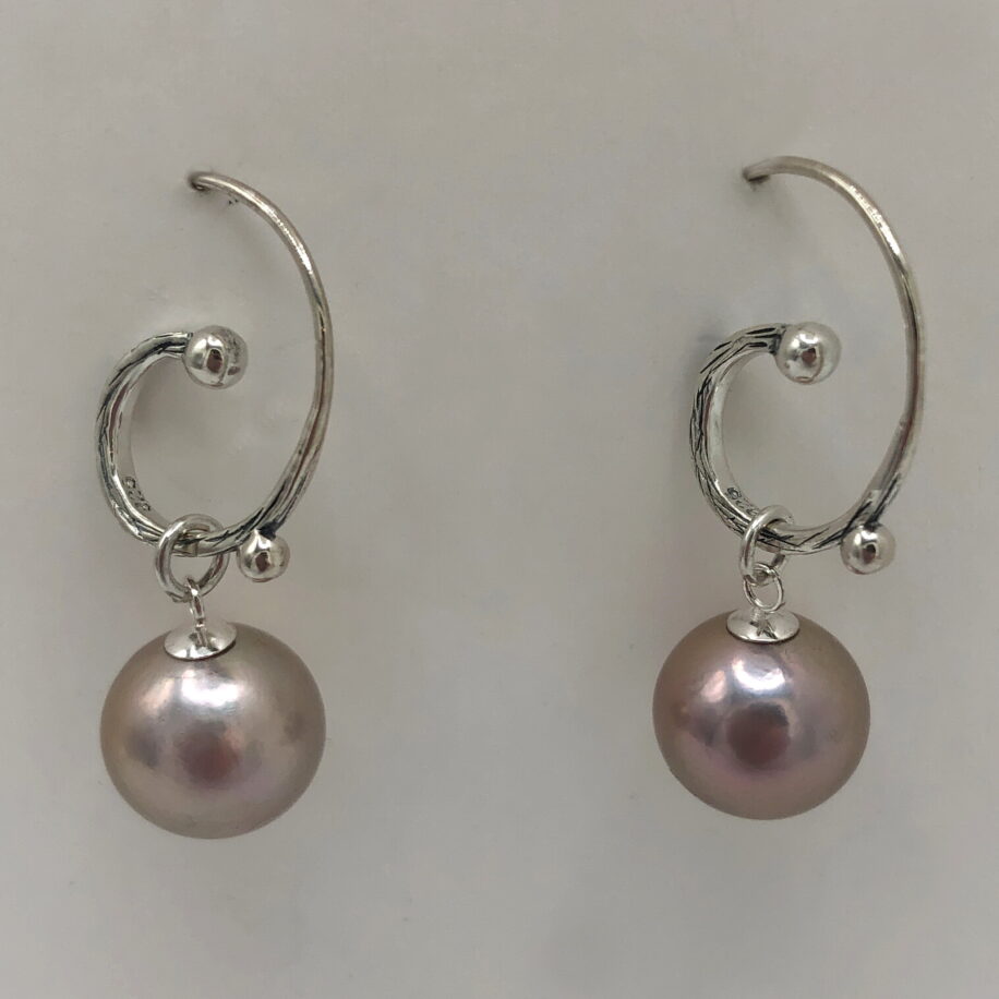 Edison Pearl & Sterling Silver Hammered Curled Wire Earrings by Val Nunns at The Avenue Gallery, a contemporary fine art gallery in Victoria, BC, Canada.