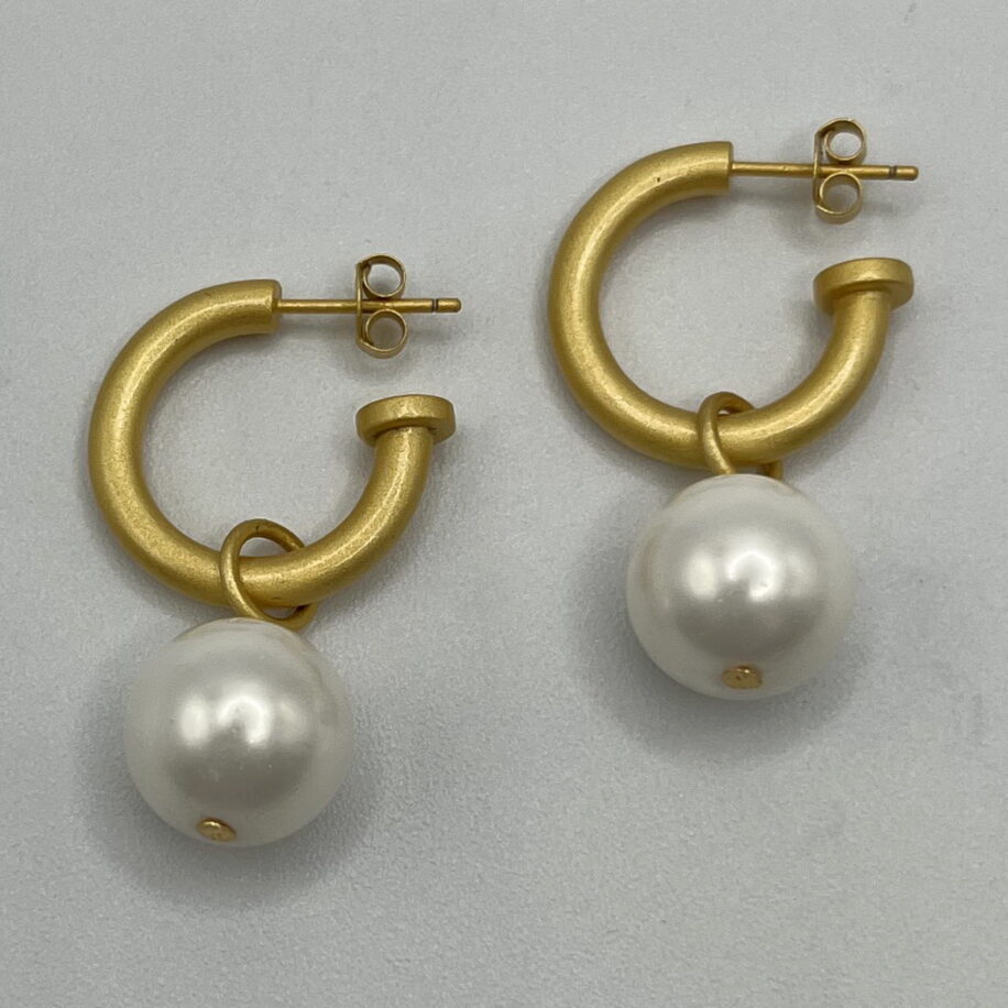 White Shell Pearl & Yellow Gold-Plated Hoop Earrings by Val Nunns at The Avenue Gallery, a contemporary fine art gallery in Victoria, BC, Canada.