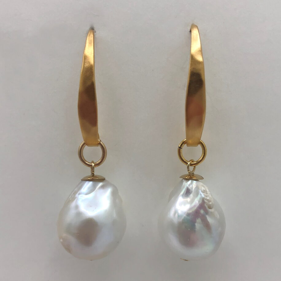 White Baroque Pearl & Gold-Plated Earrings by Val Nunns at The Avenue Gallery, a contemporary fine art gallery in Victoria, BC, Canada.