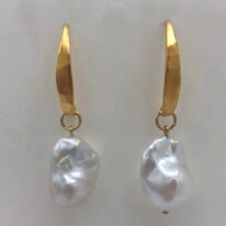 White Baroque Pearl & Yellow Gold-Plated Earrings by Val Nunns at The Avenue Gallery, a contemporary fine art gallery in Victoria, BC, Canada.