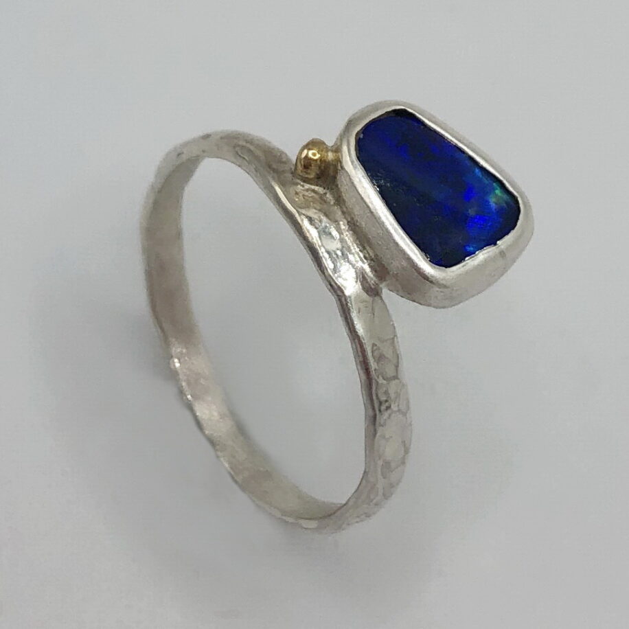 Opal Doublet Ring with Hammered Band by Andrea Russell at The Avenue Gallery, a contemporary fine art gallery in Victoria, BC, Canada.