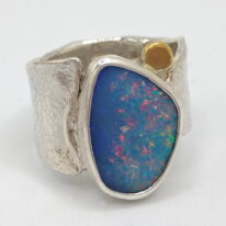 Wide Reticulated Band Ring with Australian Boulder Opal by Andrea Russell at The Avenue Gallery, a contemporary fine art gallery in Victoria, BC, Canada.