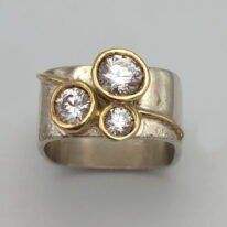 Large Tri-Blossom Ring by Chi's Creations at The Avenue Gallery, a contemporary fine art gallery in Victoria, BC, Canada.