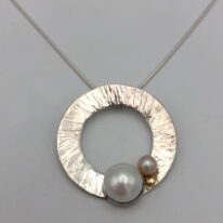 Large Hammered Silver Reef Pendant with Mabe White Pearl & Pink Pearl by Chi's Creations at The Avenue Gallery, a contemporary fine art gallery in Victoria, BC, Canada.