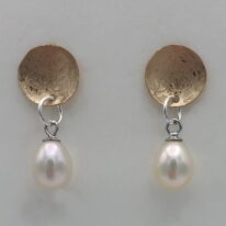 Balanced Scribbled Concaved Gold-Filled Disc Earrings with White Pearls by Chi's Creations at The Avenue Gallery, a contemporary fine art gallery in Victoria, BC, Canada.