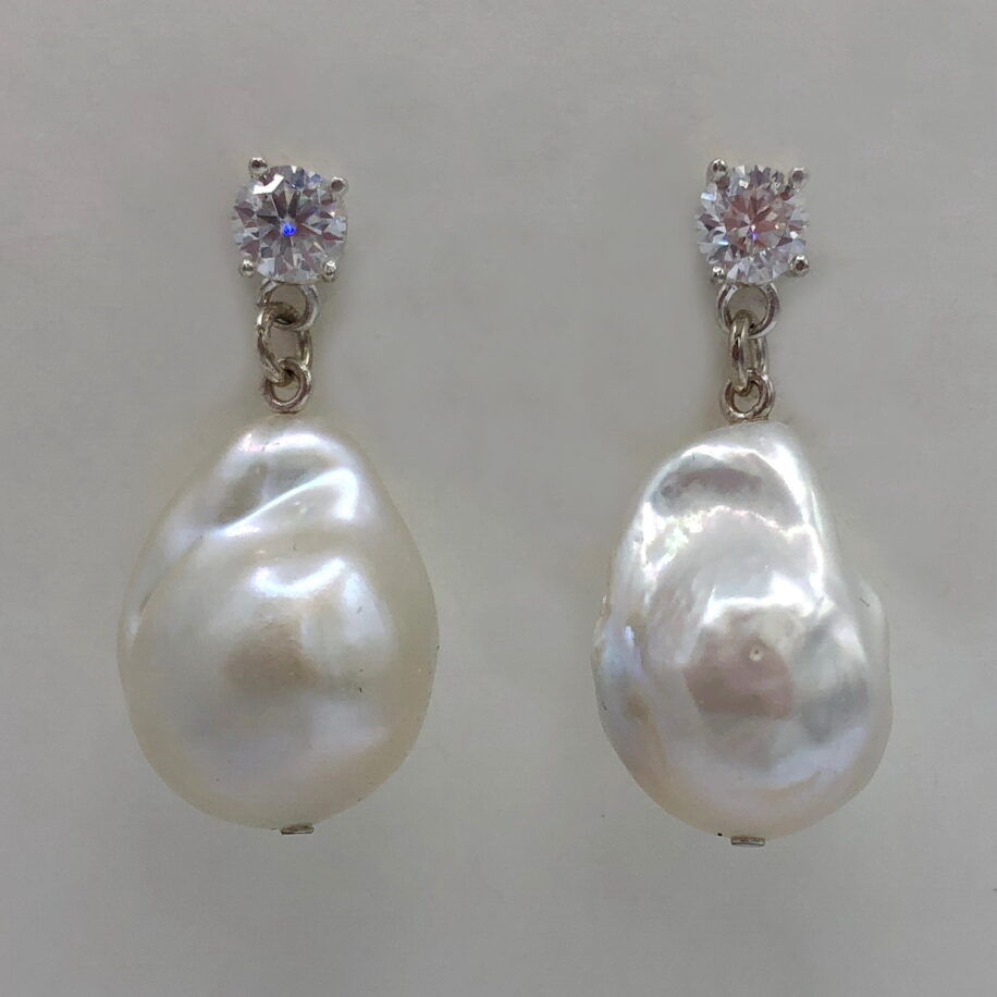 White Baroque Pearl & Lab Grown Diamond Earrings by Val Nunns at The Avenue Gallery, a contemporary fine art gallery in Victoria, BC, Canada.