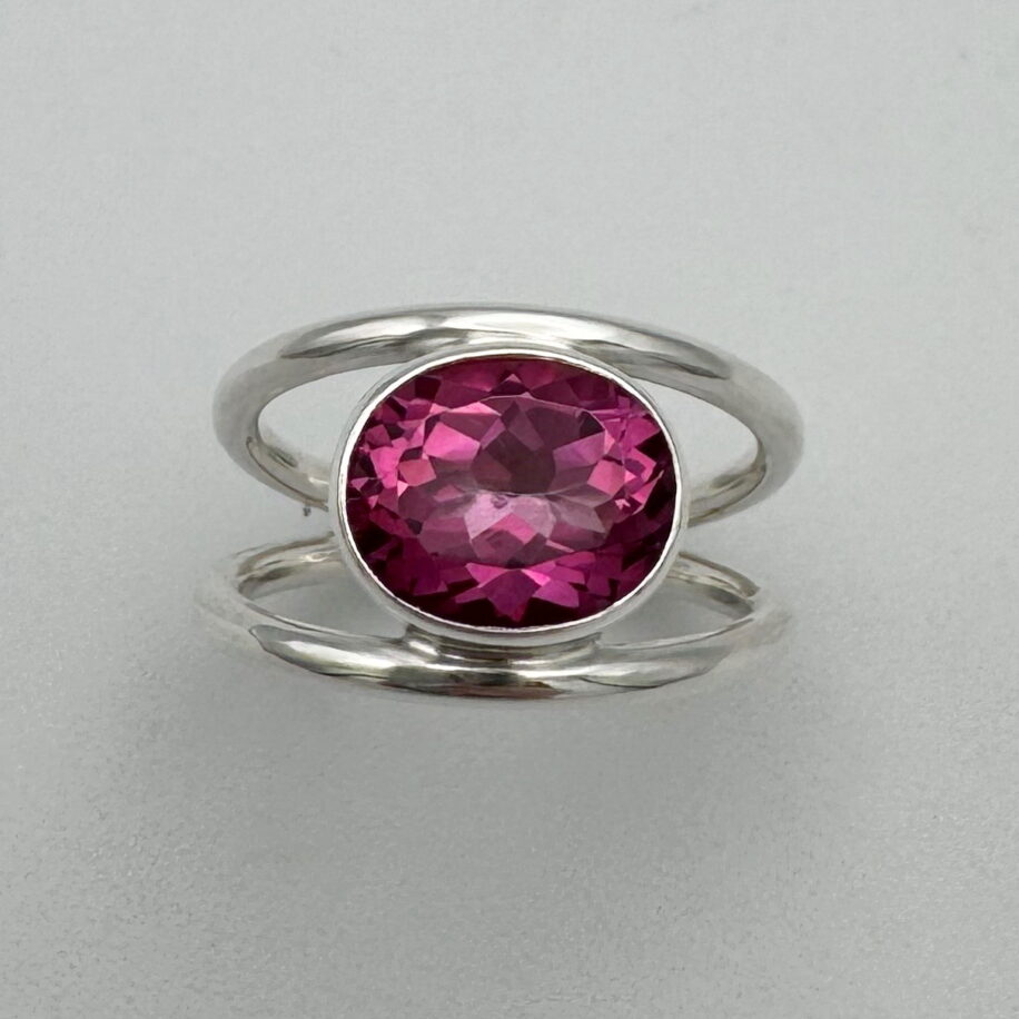 Round Double-Band Ring with Pink Topaz by A & R Jewellery at The Avenue Gallery, a contemporary fine art gallery in Victoria, BC, Canada.